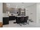 Modern kitchen with grey cabinets, white countertops and stainless steel appliances at 4106 N Thatcher, Tampa, FL 33614