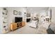 Open-concept living room with modern decor, white tile floors and ample seating at 4106 N Thatcher, Tampa, FL 33614