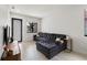 Comfortable living room featuring an oversized sectional couch and stylish decor at 4106 N Thatcher, Tampa, FL 33614