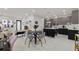 Spacious living room open to a modern kitchen, featuring sleek countertops and stainless steel appliances at 4106 N Thatcher, Tampa, FL 33614
