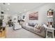 Bright, open-concept living room featuring neutral decor and abundant natural light at 4106 N Thatcher, Tampa, FL 33614
