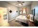 Inviting bedroom featuring a cozy rug, stylish decor, and comfortable bedding, perfect for relaxation at 4114 E Sewaha St, Tampa, FL 33617