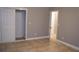 Bedroom with neutral walls, closet with sliding doors, and tile flooring at 4114 E Sewaha St, Tampa, FL 33617