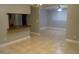 Bright and airy dining area connects to a living space, kitchen, and neutral-colored walls, perfect for gatherings at 4114 E Sewaha St, Tampa, FL 33617
