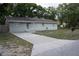 Charming single-story home with a well-maintained driveway and walkway leading to the front door at 4114 E Sewaha St, Tampa, FL 33617