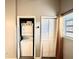 Efficient laundry area features a stacked washer and dryer, maximizing space in a convenient location at 4114 E Sewaha St, Tampa, FL 33617