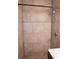 Shower features large tiled walls, showerhead, and controls at 4114 E Sewaha St, Tampa, FL 33617