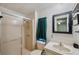 A functional bathroom featuring a shower and vanity, designed for comfort and daily convenience at 4801 Blanco Dr, Zephyrhills, FL 33541