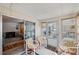 Sunroom features comfortable seating and leads into the main living area at 4801 Blanco Dr, Zephyrhills, FL 33541