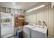 This laundry room also provides access to the back patio at 4801 Blanco Dr, Zephyrhills, FL 33541