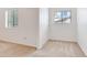 Bright bedroom with plush carpet and large windows that let in natural light at 4802 W Dryad St, Tampa, FL 33629