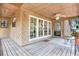 Exterior view of the home's deck featuring French doors at 4802 W Dryad St, Tampa, FL 33629