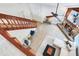 Spacious living room featuring staircase, fireplace, and ample seating at 4802 W Dryad St, Tampa, FL 33629