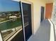 Large balcony featuring a railing and sliding glass door with a beautiful view at 4900 Brittany S Dr # 808, St Petersburg, FL 33715