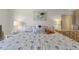 Comfortable bedroom with nautical bedding and artwork, designed for a relaxing stay at 4900 Brittany S Dr # 808, St Petersburg, FL 33715