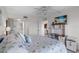 Cozy bedroom with a view to the ensuite bathroom and adjacent living room, offering comfortable living at 4900 Brittany S Dr # 808, St Petersburg, FL 33715