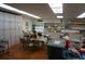 Large craft room featuring tables, chairs, storage cabinets and shelves at 4900 Brittany S Dr # 808, St Petersburg, FL 33715