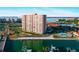 Waterfront condo building with bay views, a community pool, and marina at 4900 Brittany S Dr # 808, St Petersburg, FL 33715