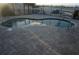 Relaxing outdoor hot tub surrounded by stone pavers, offering a tranquil space for unwinding after a long day at 4900 Brittany S Dr # 808, St Petersburg, FL 33715