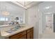 Living area viewed from kitchen pass-through with balcony access at 4900 Brittany S Dr # 808, St Petersburg, FL 33715