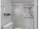 Modern bathroom shower with sleek glass door and convenient grab bar at 4900 Brittany S Dr # 808, St Petersburg, FL 33715