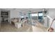 The open-concept living room offers recessed lighting, modern decor, and lovely tile floors at 500 Treasure Island Cswy # 704, Treasure Island, FL 33706