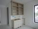 Modern kitchen with minimalist white and light cabinets at 501 W Ross Ave # 1, Tampa, FL 33602