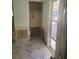 Hallway is in renovation with door to the screened in porch at 5105 Bonito Dr, New Port Richey, FL 34652