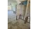 Kitchen during renovation with open space and terrazzo flooring at 5105 Bonito Dr, New Port Richey, FL 34652