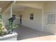 The covered patio has a decorative dolphin statue at 5105 Bonito Dr, New Port Richey, FL 34652