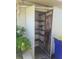 Exterior storage area featuring shelving, awaiting organization and personal touches at 5105 Bonito Dr, New Port Richey, FL 34652