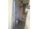 The storage room has plywood walls and a concrete floor at 5105 Bonito Dr, New Port Richey, FL 34652