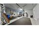 Spacious garage equipped with workout equipment and ample storage space at 5318 Candler View Dr, Lithia, FL 33547