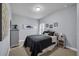 Bedroom featuring a dark colored bed, grey walls, and a carpeted floor at 5910 Caldera Ridge Dr, Lithia, FL 33547