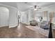 Open-concept living area with hardwood floors, comfortable seating, and natural light at 5910 Caldera Ridge Dr, Lithia, FL 33547