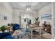 Bright home office with a large desk, comfortable seating, stylish decor, and ample natural light at 5910 Caldera Ridge Dr, Lithia, FL 33547