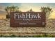 Elegant community sign showcasing the FishHawk Ranch development at 5910 Caldera Ridge Dr, Lithia, FL 33547
