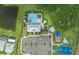 Overhead view of a community pool with lounge chairs, cabanas, and a playground nearby at 5953 Bluestar Ct, Lakewood Ranch, FL 34211