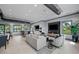 Well-appointed clubhouse featuring a large television, sofas, and chairs for social gatherings at 5953 Bluestar Ct, Lakewood Ranch, FL 34211