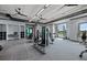 Well-equipped gym with weight machines and a water filling station for a comprehensive workout at 5953 Bluestar Ct, Lakewood Ranch, FL 34211