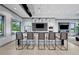 Modern kitchenette features sleek counters, stainless appliances, and stylish pendant lighting at 5953 Bluestar Ct, Lakewood Ranch, FL 34211