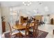 Open dining area, perfect for hosting, adjacent to the living room and foyer at 6407 E 112Th Ave, Temple Terrace, FL 33617