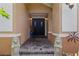 The home's entrance features double doors and lion statues flanking the brick steps at 6407 E 112Th Ave, Temple Terrace, FL 33617