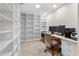 Functional office featuring built-in bookshelves and a desk area, ideal for remote work or study at 6407 E 112Th Ave, Temple Terrace, FL 33617