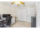 Home office featuring a ceiling fan and a double closet at 6407 E 112Th Ave, Temple Terrace, FL 33617