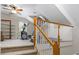Second-floor room featuring a ceiling fan and carpeted floors, perfect for a home gym at 6407 E 112Th Ave, Temple Terrace, FL 33617