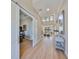 Open foyer with soaring ceilings, elegant hardwood floors, and abundant natural light, creating a grand entrance at 715 Pinckney Dr, Apollo Beach, FL 33572
