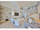 Expansive living room features a two-story design, marble accents, and open layout with a staircase at 715 Pinckney Dr, Apollo Beach, FL 33572