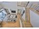 Open-concept living room features hardwood floors, a fireplace, and ample seating at 715 Pinckney Dr, Apollo Beach, FL 33572