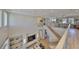 Open concept living room with hardwood floors, a fireplace, and modern furnishings at 715 Pinckney Dr, Apollo Beach, FL 33572